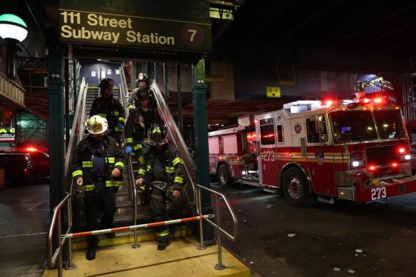 Firefighters at the scene of the subway surfing accident that killed a teen girl. 