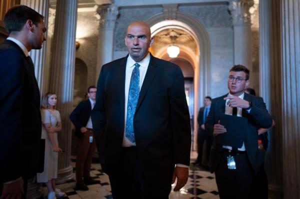 Sen. John Fetterman vowed to wear at suit to the Senate Chamber if the House of Representatives avoids a government shutdown and supports aide to Ukraine.