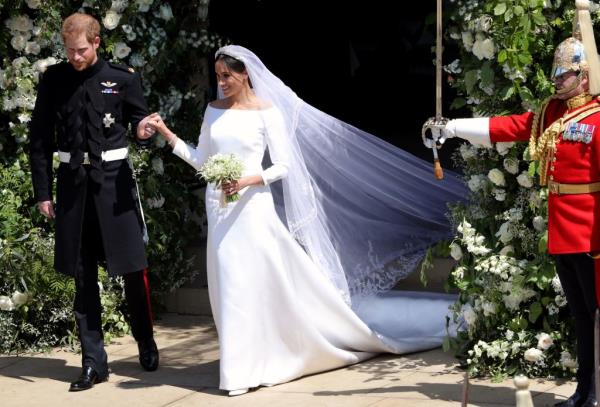 Meghan Markle's wedding dress designer reveals wher<em></em>e 'something blue' was 'secretly hidden'