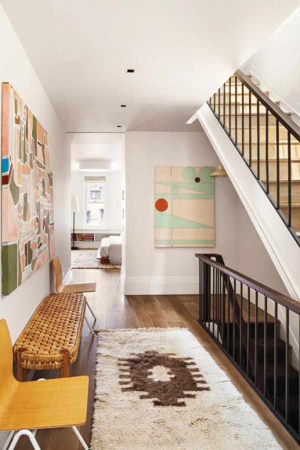Neutral to<em></em>nes and cozy design elements make this townhouse a home.