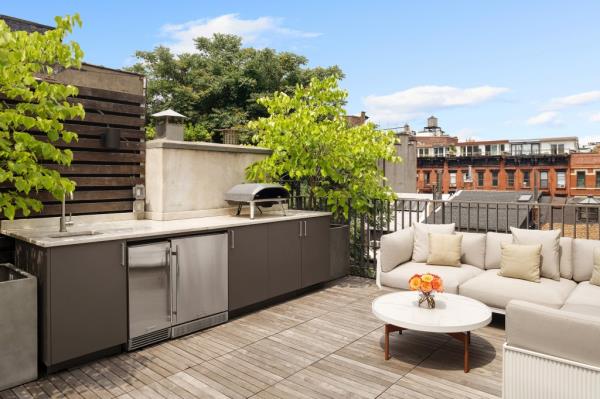 The roof terrace with a pizza oven.