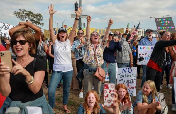 Parents protesting in San Diego during the Covid crisis.