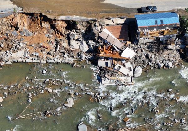 Aerial view of a structure destroyed by floodwaters from Hurricane Helene in Bat Cave, North Carolina