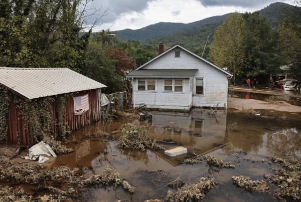 An American flag hanging above floodwaters in Swannanoa, North Carolina, aftermath of Hurricane Helene