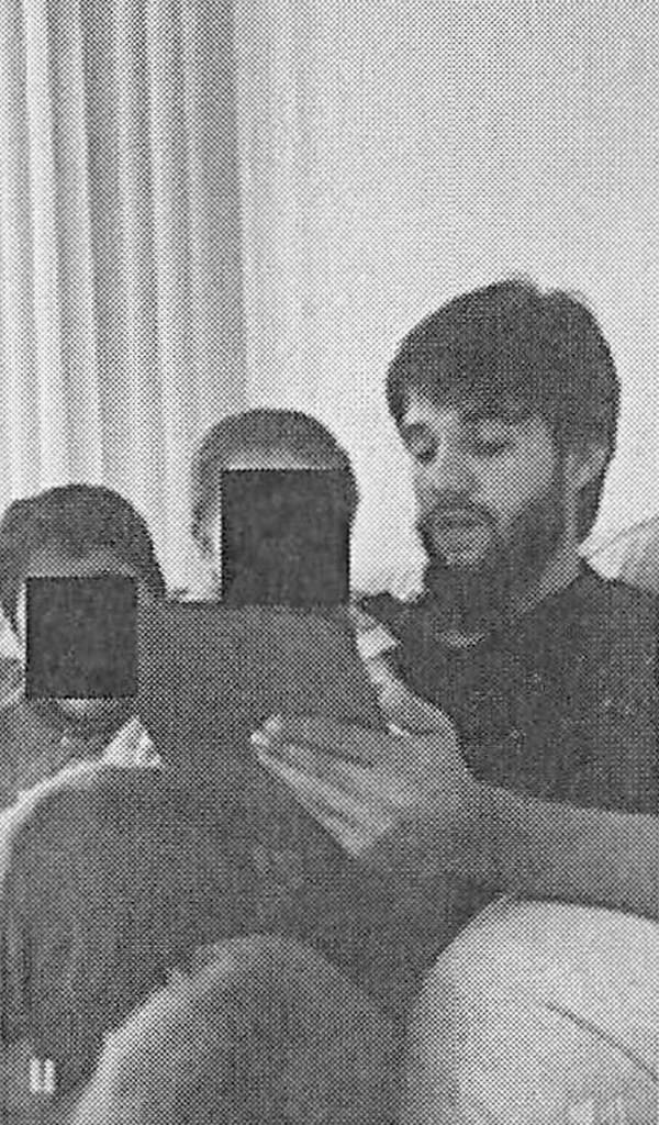 Nasir Ahmad Tawhedi with his daughter and another child.