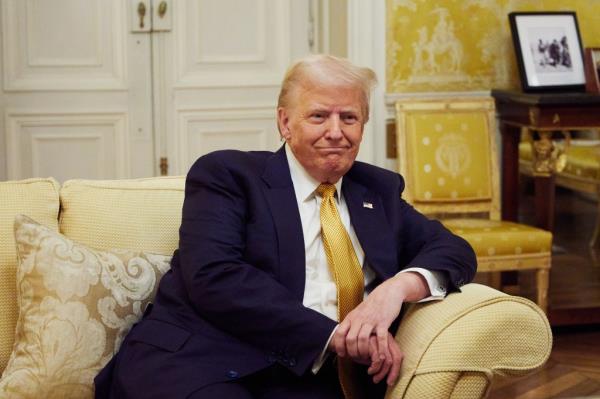 President-Elect Do<em></em>nald Trump reacts during his meeting with Prince William, Prince of Wales at the Embassy of the United Kingdom's Residence on December 7, 2024 in Paris, France.