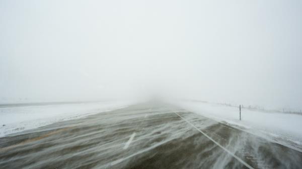 A snowy US Highway 20 is seen during a blizzard near Galva, Iowa