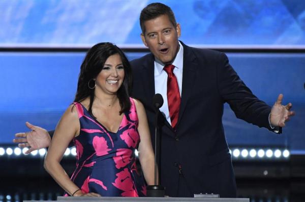 Campos-Duffy and husband Sean Duffy on stage.
