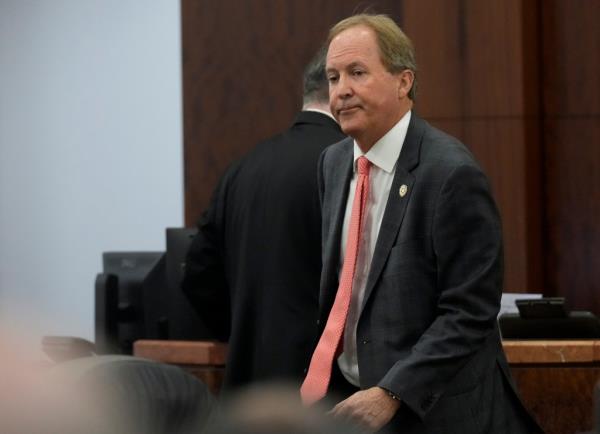 Texas Attorney General Ken Paxton appears at a pretrial hearing in his securities fraud case before state District Judge Andrea Beall in the 185th District Court Tuesday, March 26, 2024 at Harris County Criminal Courts at Law in Houston.