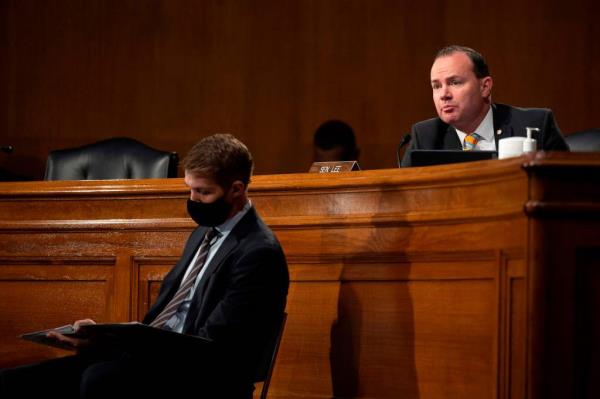 US Senator Mike Lee (R), R-UT, questions Former Michigan Governor Jennifer Granholm during the Senate Energy and Natural Resources Committee hearing to examine her nomination to be Secretary of Energy, on Capitol Hill in Washington, DC, on January 27, 2021.