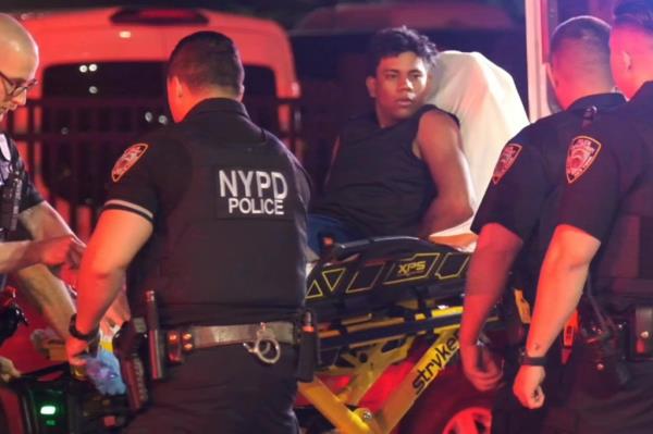 Police officers at the scene of a crime wher<em></em>e Venezuelan migrant Bernardo Raul Castro Mata was arrested for shooting two cops in Queens.