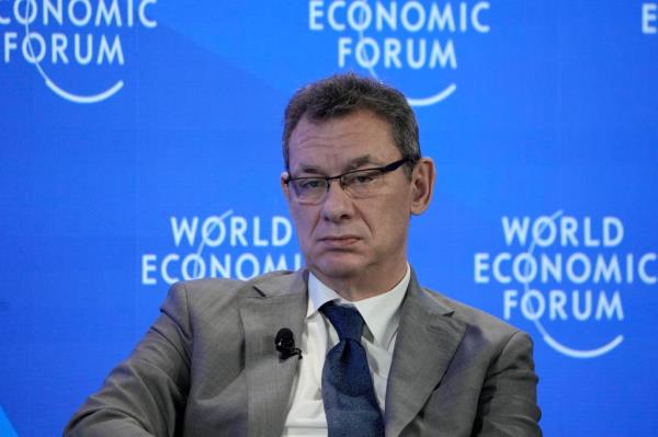 Pfizer CEO Albert Bourla sits on a podium at the World Eco<em></em>nomic Forum in Davos, Switzerland, on Jan. 19, 2023. The fallout from the Israel-Hamas war has spilled into workplaces everywher<em></em>e.