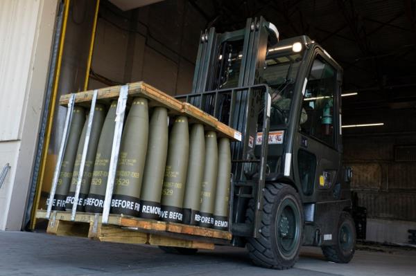 FILE - Airmen with the 436th Aerial Port Squadron use a forklift to move 155 mm shells ultimately bound for Ukraine, April 29, 2022, at Dover Air Force ba<em></em>se, Del. For almost 20 mo<em></em>nths the Pentagon has spearheaded a mo<em></em>nthly gathering of a<em></em>bout 50 allies wher<em></em>e the U.S. has led the way in sending billions of dollars in aid to Kyiv. But on Jan. 23, 2024, for the first time since Secretary of Defense Lloyd Austin established the group in April of 2022, the U.S. will come to the table out of money, unable to send Ukraine the ammunition and missiles it needs to fend off Russia. (AP Photo/Alex Brandon, File)