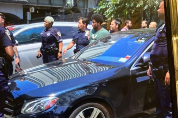 Alleged shooter is taken in by police. 