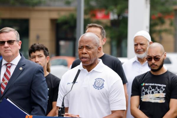 Mayor Adams at a press co<em></em>nference on charges against Muslim teen who killed gay, black man.