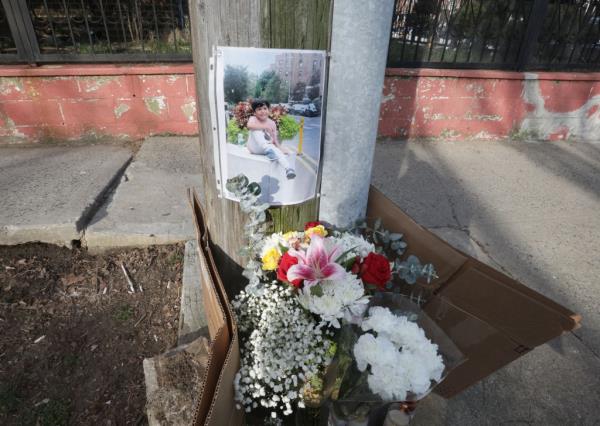 Flowers left at the scene of the fatal crash.