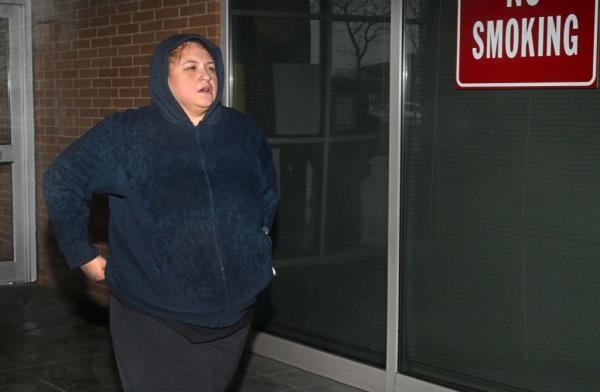 Alexis Nieves, 33, leaves court after being arraigned on of Hindering Prosecution 1st Degree, Tampering with Physical Evidence and Co<em></em>ncealment of a Human Corpse.