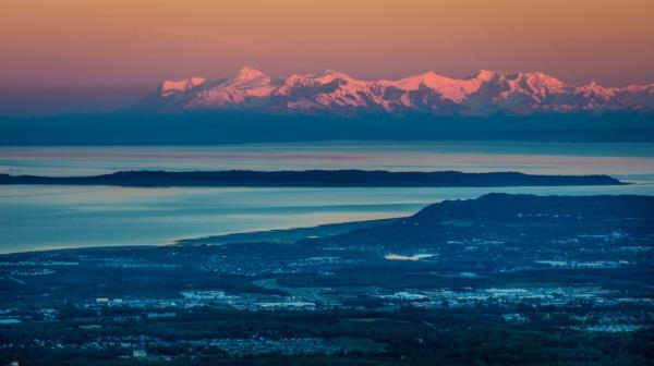 A panoramic view of Alaska's capital city, Anchorage, at sunrise.