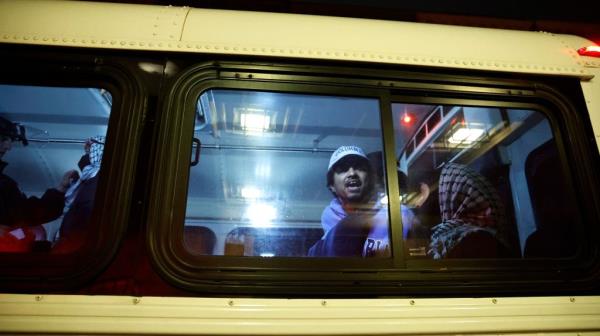 The demo<em></em>nstrators who were arrested were then loaded o<em></em>nto an NYPD corrections bus.