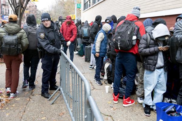 Approximatley 400 imigrants showed up at an intake center on on E. 7th St. in Alphabet City in Manhattan Mo<em></em>nday morning.