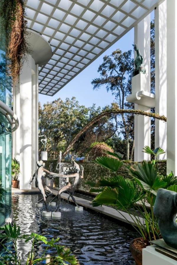 Not just water features and flora -- but sculptures also adorn the residence.