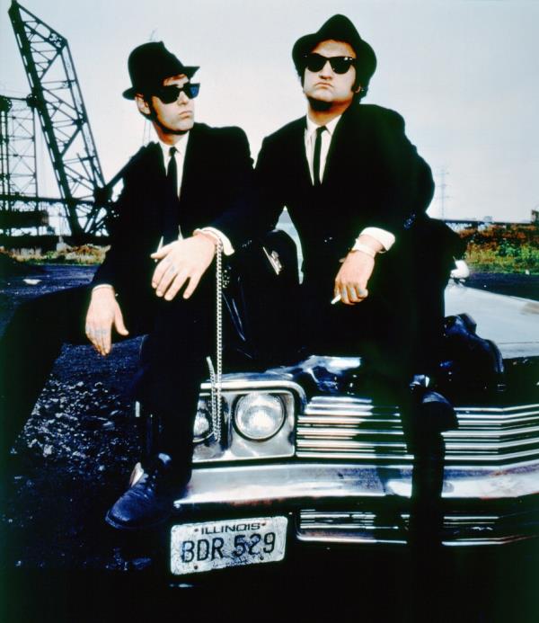 Canadian actor and screenwriter Dan Aykroyd and American actor John Belushi on the set of The Blues Brothers.