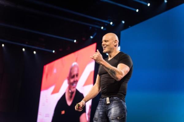 brad burton speaking on stage