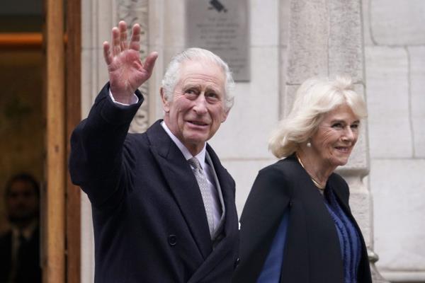 King Charles III and Queen Camilla waving as they leave The Lo<em></em>ndon Clinic in central Lo<em></em>ndon on Jan. 29, 2024