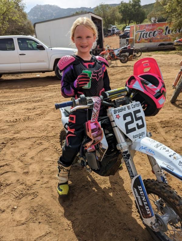 Carlton died after crashing when she collided with another juvenile rider.