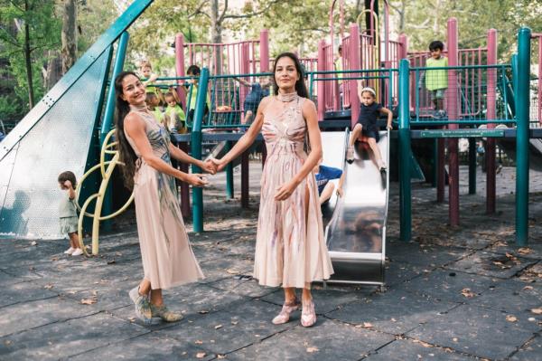 Twins Gabriela Mordocea and Mihaela Mordocea at the playground at John Jay park. 