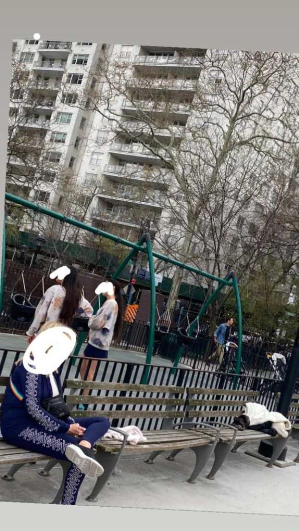People at John Jay Park with faces scribbled out. 