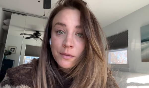 Kaley Cuoco taking a selfie, reflecting on the difficult decision to rehome her pet dog
