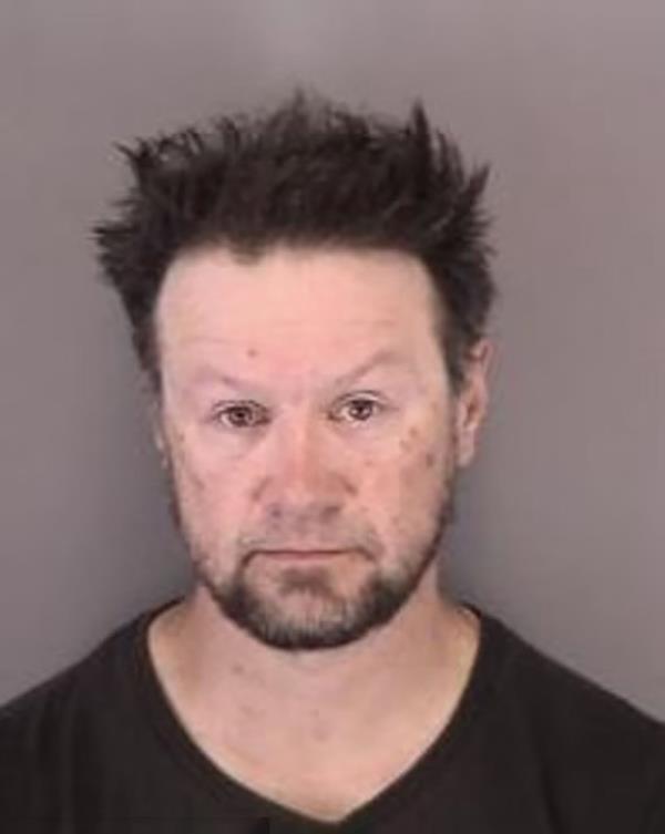Joseph Adam Moore is pictured in his mugshot.
