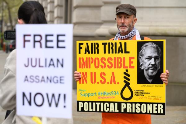 Supporters of Julian Assange protesting for his freedom outside Australia House in London, England