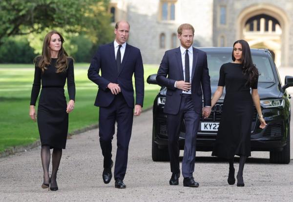 Prince William, Prince Harry, Duchess Catherine and Duchess Meghan, greeting crowd outside Windsor Castle in tribute to Queen Elizabeth II