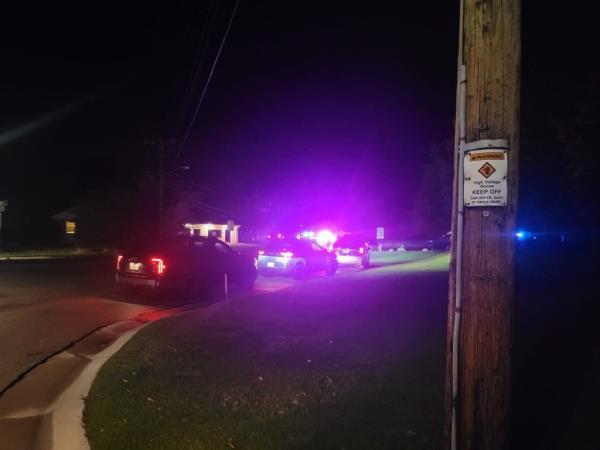 Police vehicles are pictured outside of the school Mo<em></em>nday night.