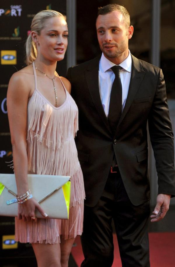 This Nov. 4, 2012 photo shows Oscar Pistorius and girlfriend Reeva Steenkamp at an awards ceremony in Johannesburg, South Africa. 