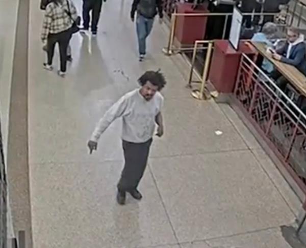 Vagrant wanders around Grand Central Terminal. 