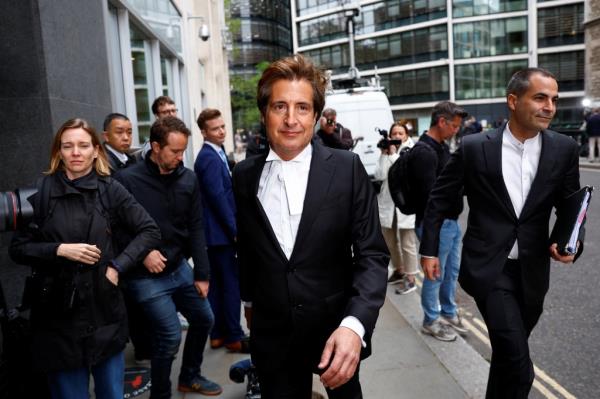 Lawyer David Sherborne, a member of Britain's Prince Harry, Duke of Sussex's legal team, walks outside the Rolls Building of the High Court in London.