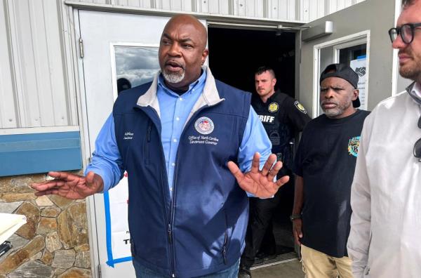 Mark Robinson spoke with the media outside the Ag Center Shelter near the Asheville Regio<em></em>nal Airport in Asheville, NC, during the aftermath of flooding caused by Hurricane Helene on Sept. 29, 2024.