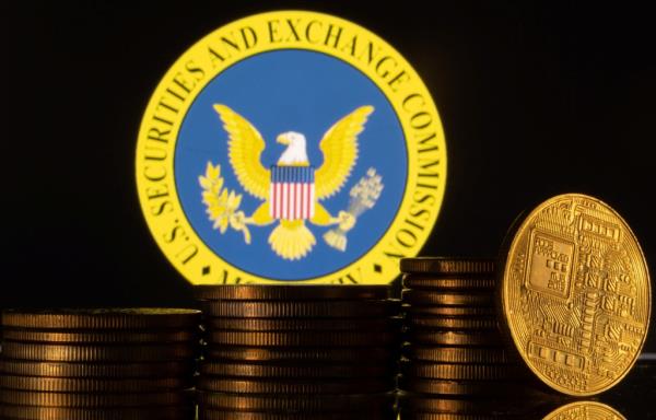 U.S. Securities and Exchange Commission logo and representations of cryptocurrency are seen in this illustration taken June 6, 2023.