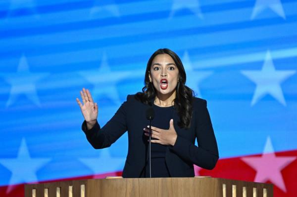 US Representative Alexandria Ocasio-Cortez speaking at the podium at the Democratic Natio<em></em>nal Co<em></em>nvention in Chicago, Illinois, on August 19, 2024