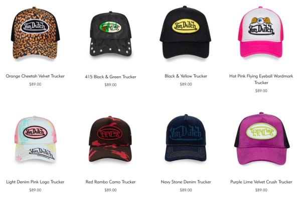 A group of hats with price tags on display