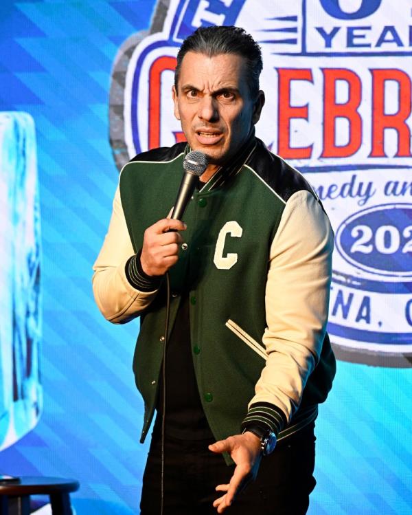 Comedian Sebastian Maniscalco performing standup with a microphone at The Ice House Comedy Club in Pasadena, California on February 21, 2024