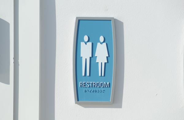 A general view of a unisex restroom sign as seen on a cruise ship in the Atlantic Ocean on September 23, 2017. 