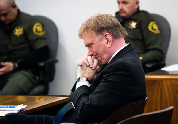 Eric Scott Sills reacts during opening statements in Orange County Superior Court in Santa Ana, CA on Tuesday, November 28, 2023