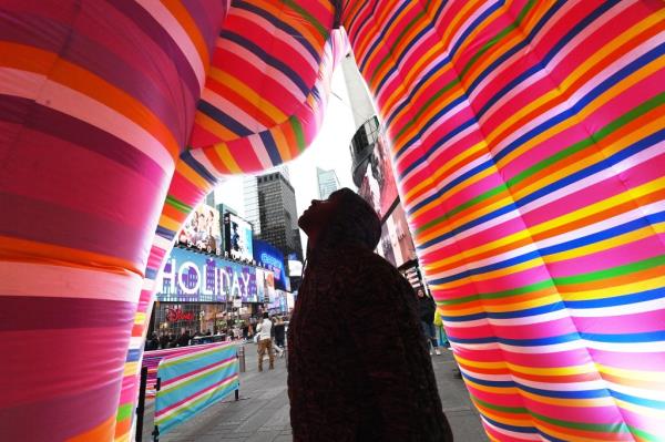 A visitor checks out the installation up-close.