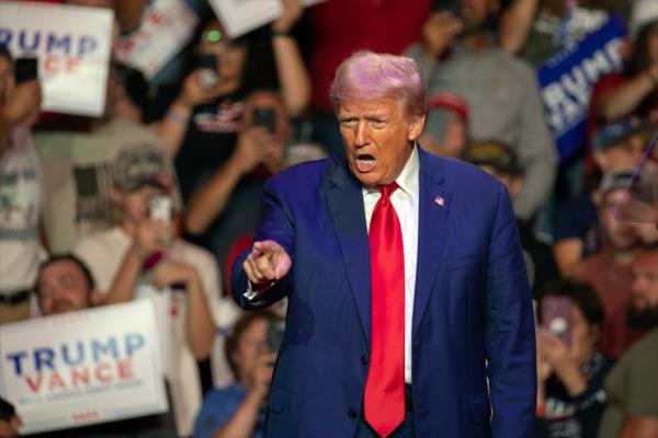 Former President Do<em></em>nald Trump, the Republican presidential nominee for 2024, pointing his finger at a campaign rally at Ed Fry Arena, Indiana.