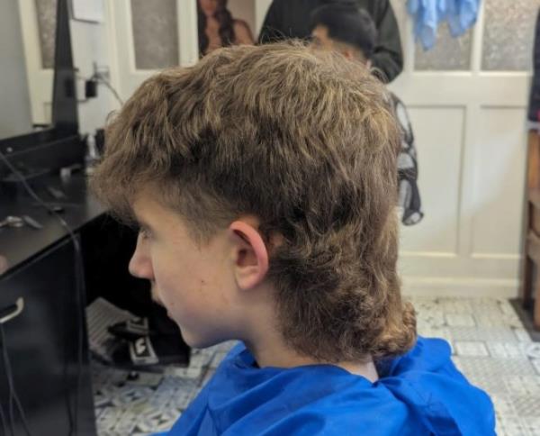 Toby Quinn, 15, at the barbers before havin<em></em>g his mullet cut. Photo released October 26 2023. See SWNS story SWLNmullet. A 15-year-old boy was put into isolation at school after being told his MULLET hairstyle was 'too extreme'. Toby Quinn was left fuming after learning his school had changed its hair policy and branded his trim as 'unacceptable' and ?unprofessional?. Teachers at St Aidan's Catholic Academy in Sunderland separated the schoolboy from his classmates and kept him isolated for a whole day. Ironically, he had previously been punished the same way for havin<em></em>g his hair too short - but was now told it was too long.