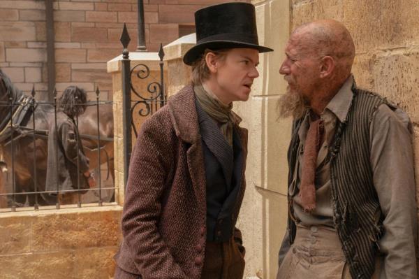 Thomas Brodie-Sangster as Dodger, and David Thewlis as Fagin. 